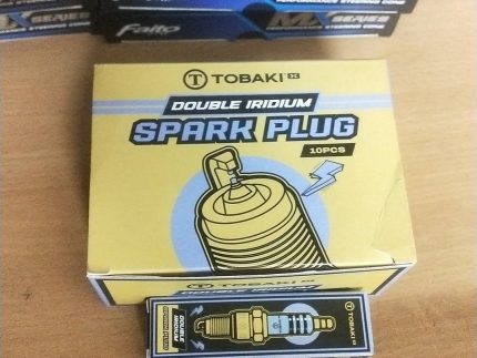 "Tobaki Double Iridium Spark Plug for motorcycles and high-performance engines."