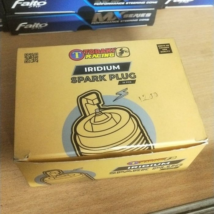 "Tobaki Racing Single Iridium Spark Plug available in various sizes for high-performance motorcycles."